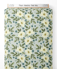 Tissu - Fleurs blanches sur fond bleu