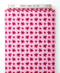 Tissu - Papillons rouges sur rose