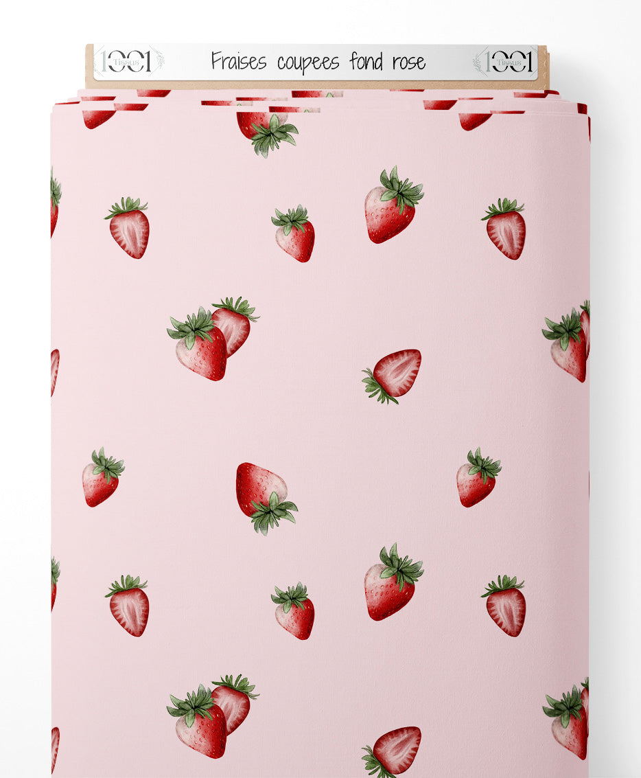 Tissu - Fraises coupées sur fond rose