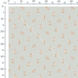 Tissu - Lapins beige sur fond vert