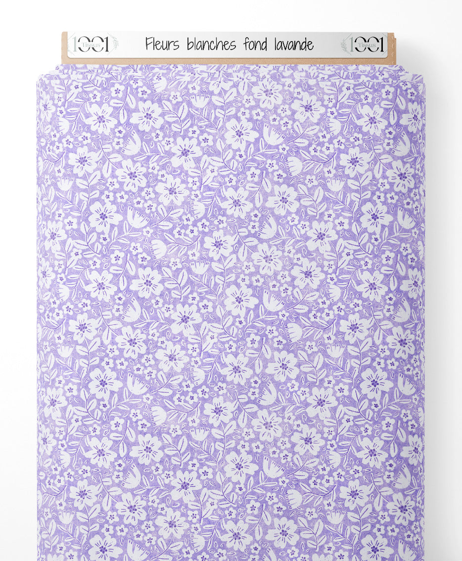 Tissu - Fleurs blanches sur fond lavande