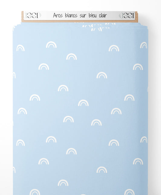 Tissu - Arcs blancs sur bleu clair