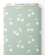 Tissu - Cerises blanches sur vert
