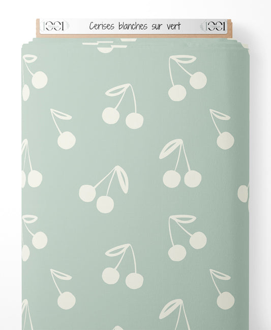 Tissu - Cerises blanches sur vert