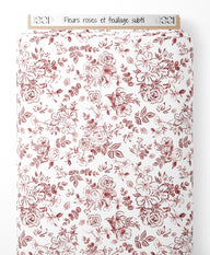 Tissu - Fleurs roses et feuillage subtil