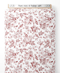 Tissu - Fleurs roses et feuillage subtil