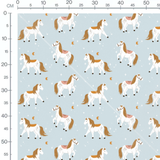 Tissu - Chevaux blancs sur bleu clair