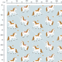 Tissu - Chevaux blancs sur bleu clair