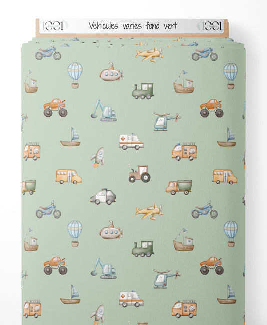Tissu - Véhicules variés sur fond vert