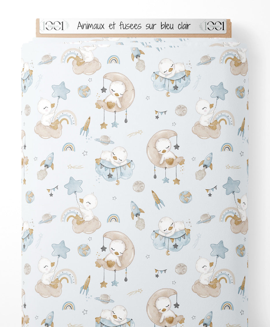 Tissu - Animaux et fusées sur bleu clair
