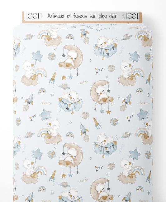 Tissu - Animaux et fusées sur bleu clair
