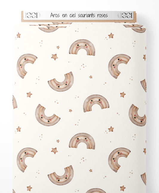 Tissu - Arcs-en-ciel souriants roses