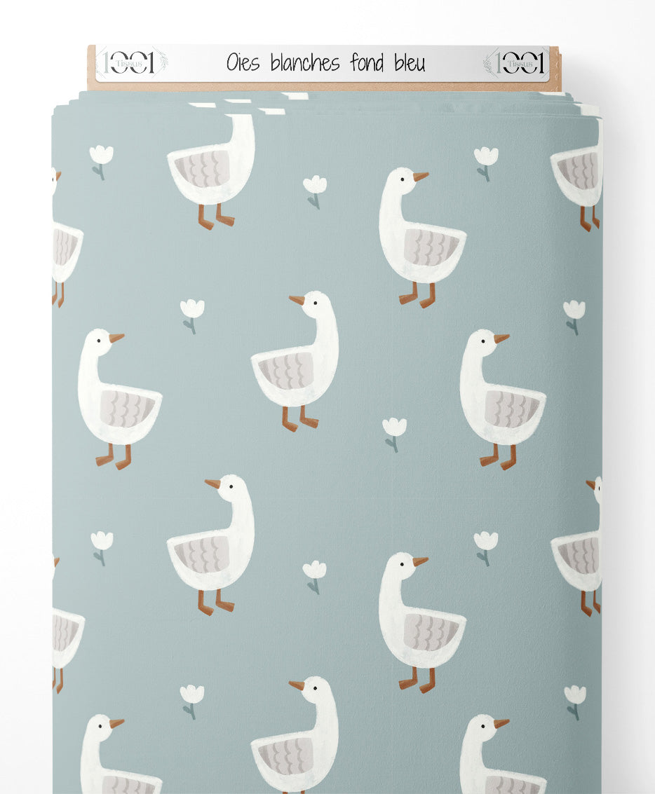 Tissu - Oies blanches sur fond bleu