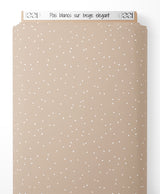Tissu - Pois blancs sur beige élégant