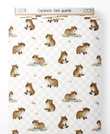 Tissu - Capybaras sur fond quadrillé