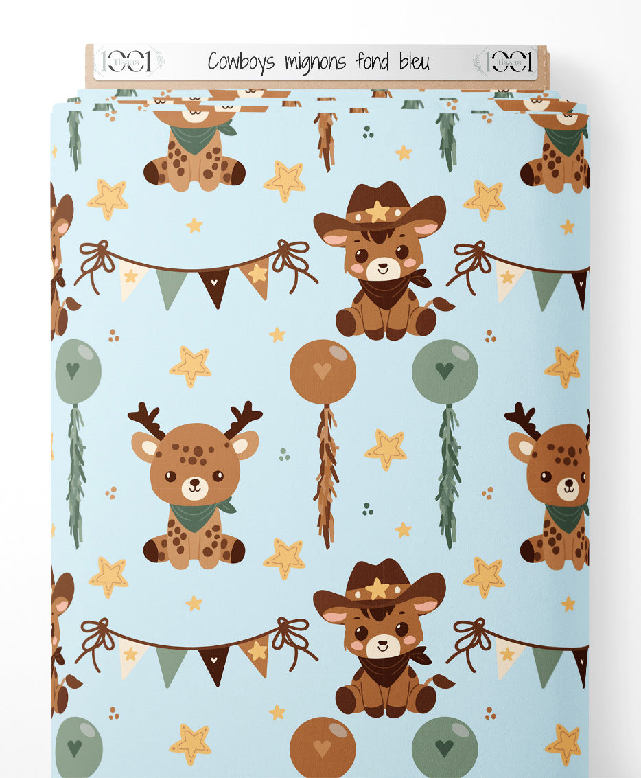 Tissu - Cowboys mignons sur fond bleu