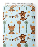 Tissu - Cowboys mignons sur fond bleu