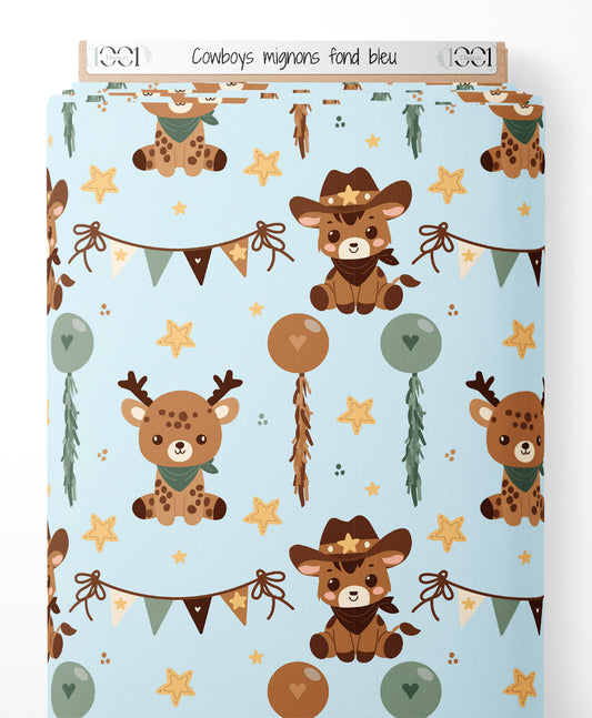 Tissu - Cowboys mignons sur fond bleu