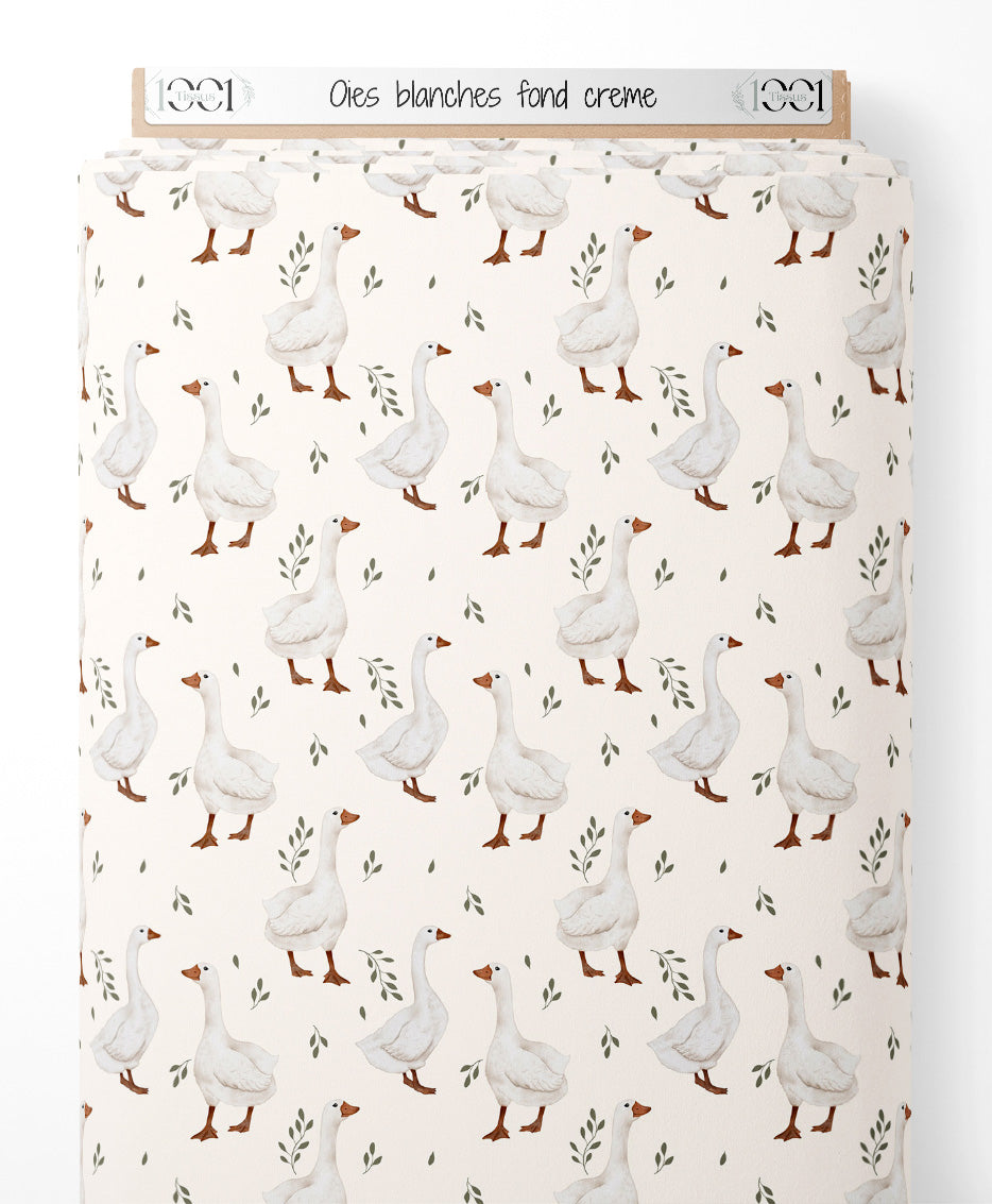 Tissu - Oies blanches sur fond crème