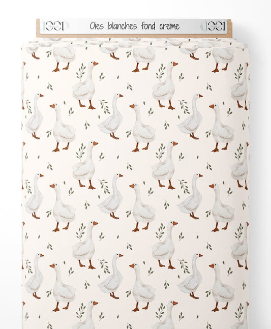Tissu - Oies blanches sur fond crème