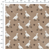 Tissu - Dinosaures à vélo marron