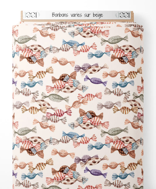 Tissu - Bonbons variés sur beige