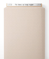 Tissu - Pois blancs sur beige régulier