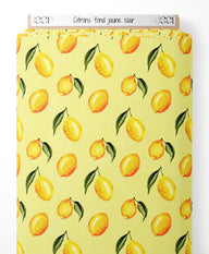 Tissu - Citrons sur fond jaune clair