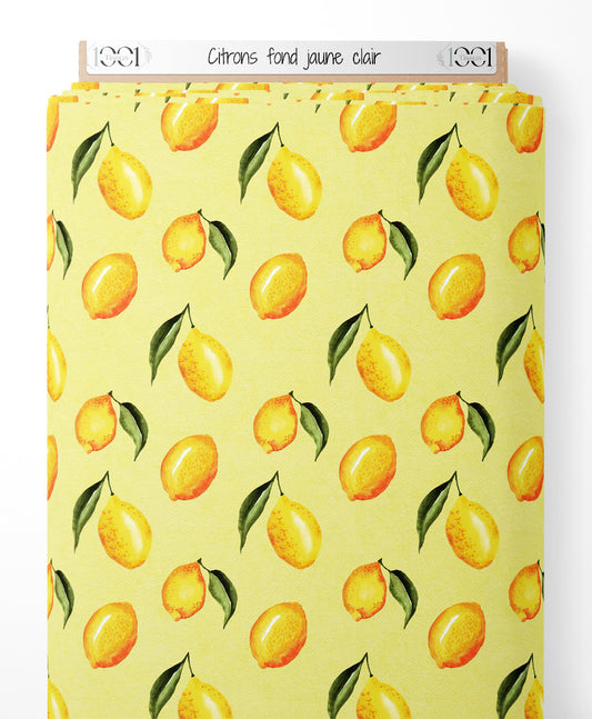 Tissu - Citrons sur fond jaune clair