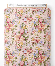 Tissu - Bouquets roses sur rose clair