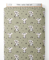 Tissu - Petites vaches sur fond vert