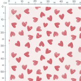 Tissu - Cœurs rouges sur rose pâle