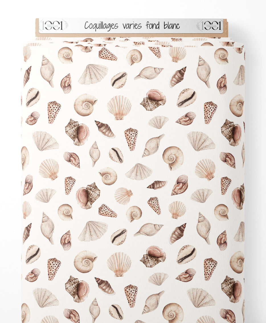 Tissu - Coquillages variés sur fond blanc
