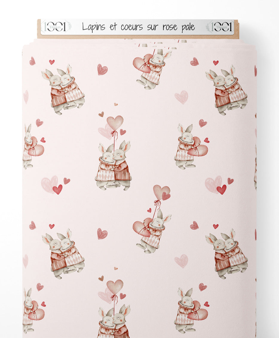 Tissu - Lapins et cœurs sur rose pâle