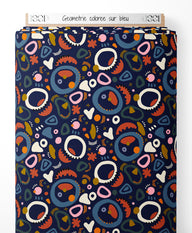 Tissu - Géométrie colorée sur bleu