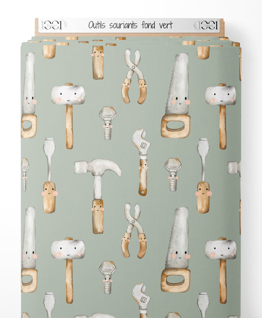 Tissu - Outils souriants sur fond vert