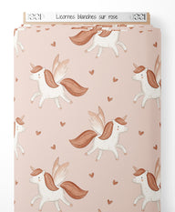Tissu - Licornes blanches sur rose