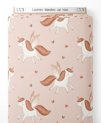 Tissu - Licornes blanches sur rose