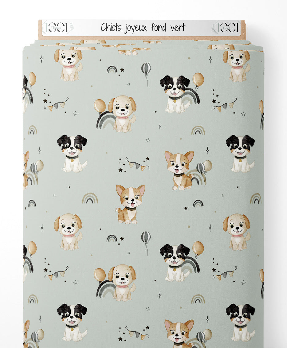 Tissu - Chiots joyeux sur fond vert