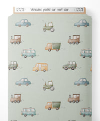 Tissu - Véhicules pastel sur vert clair