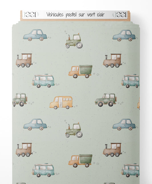 Tissu - Véhicules pastel sur vert clair