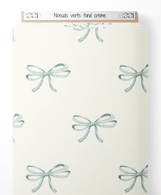 Tissu - Nœuds verts sur fond crème