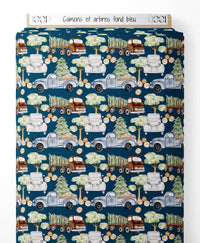 Tissu - Camions et arbres sur fond bleu