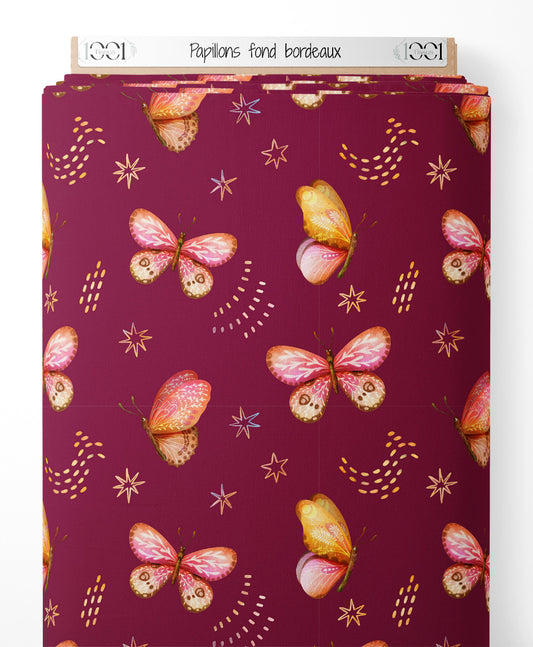 Tissu - Papillons sur fond bordeaux