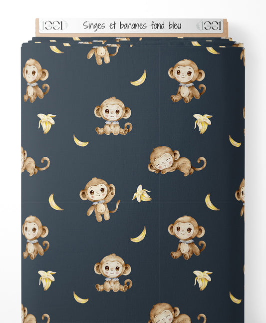 Tissu - Singes et bananes sur fond bleu