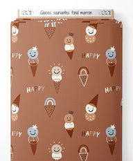 Tissu - Glaces souriantes sur fond marron