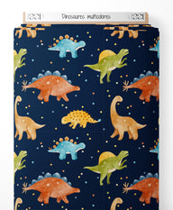 Tissu - Dinosaures multicolores sur fond