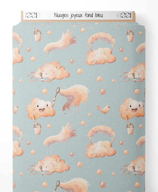 Tissu - Nuages joyeux sur fond bleu