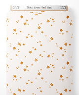 Tissu - Étoiles dorées sur fond blanc