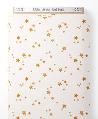 Tissu - Étoiles dorées sur fond blanc
